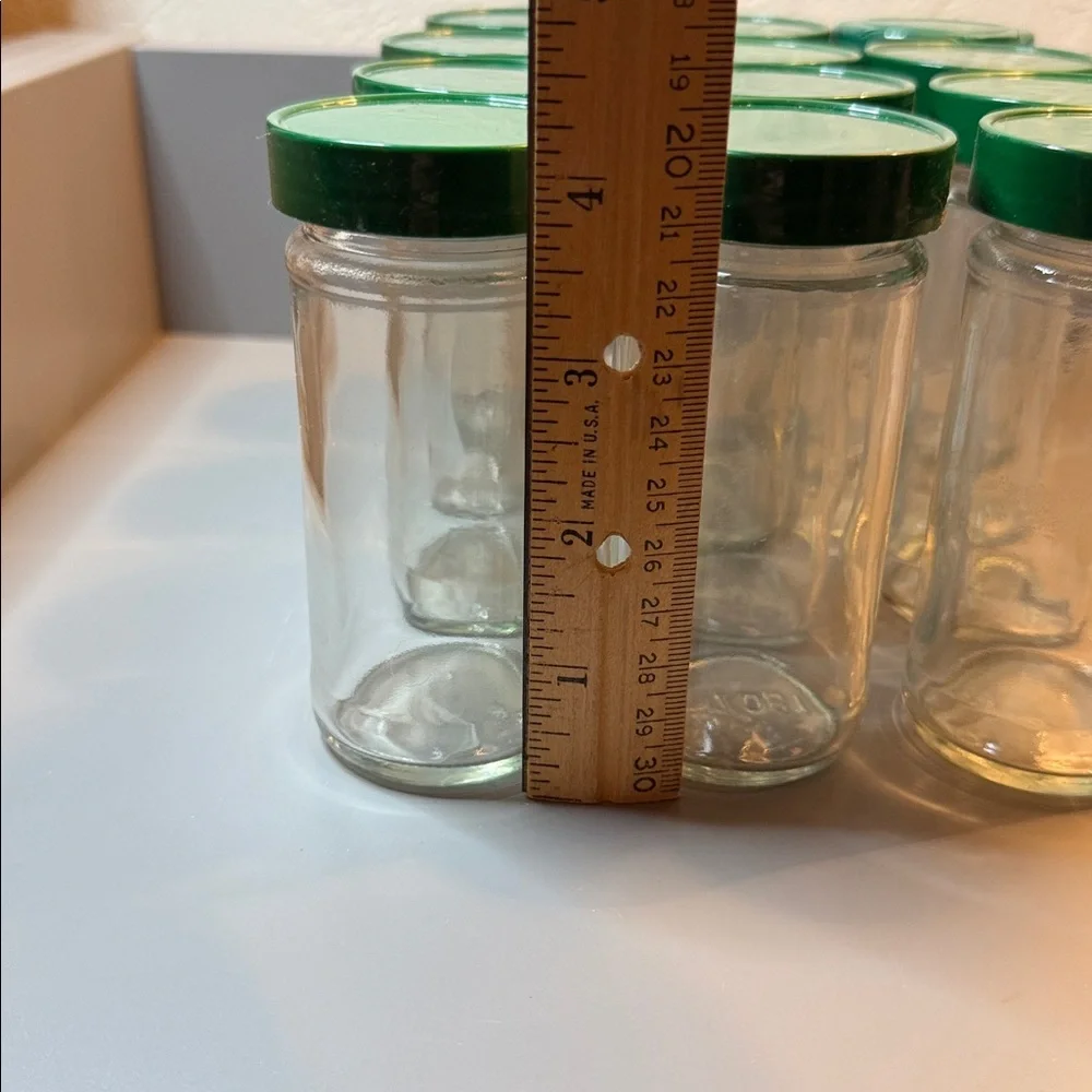 Set of 12 Vintage Glass Round Spice Jars W/ Green Lids, Approximately 4.5” Tall - Picture 4 of 8